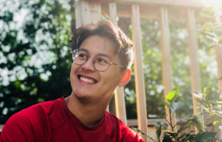 Canva Man Wearing Red Shirt And Eyeglasses